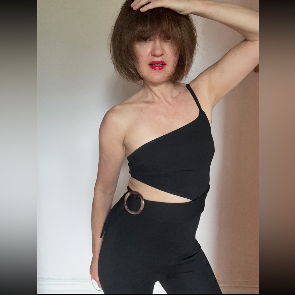 Free people one shoulder open side size 2 black jumpsuit.
